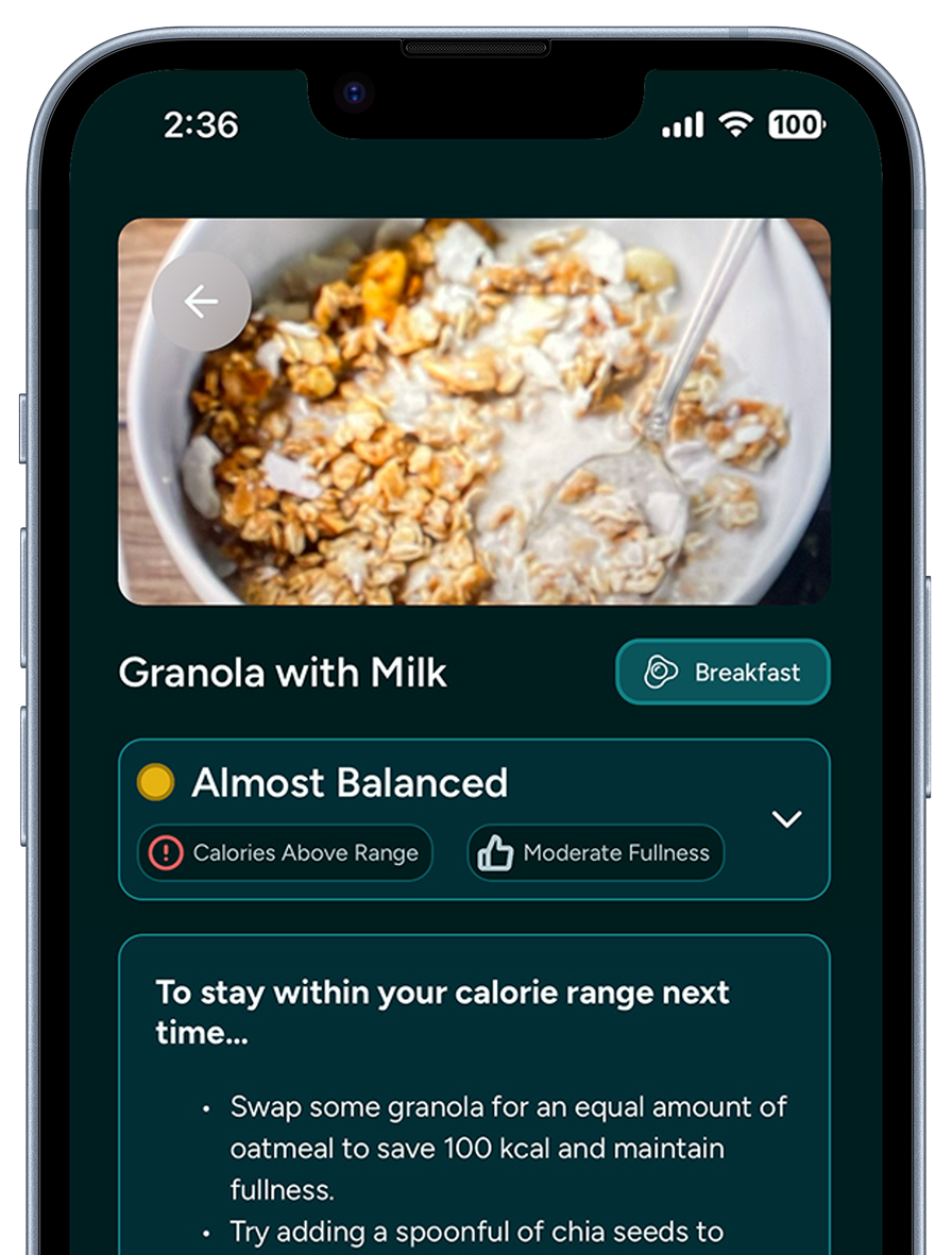 The FitMate app showing an AI analysis of a logged meal